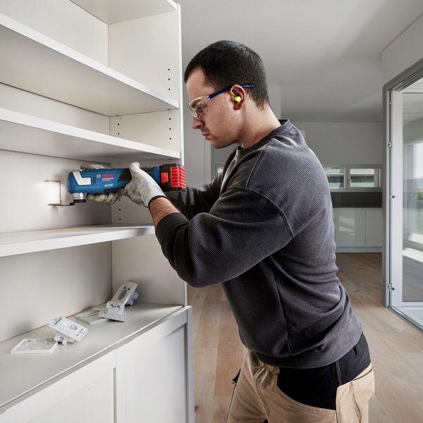 GOP 185-LI Bosch GOP 185-LI cordless multi-cutter used for shelf installation.