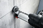 Bosch GBH 2-23 REA dust extraction hammer drilling concrete.