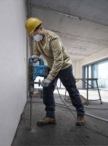 Bosch GBH 6-42 concrete rotary hammer in use.