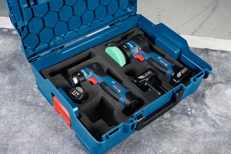 Cordless random orbit sander set with batteries and charger neatly arranged in a blue case.