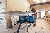 Man using table saw.